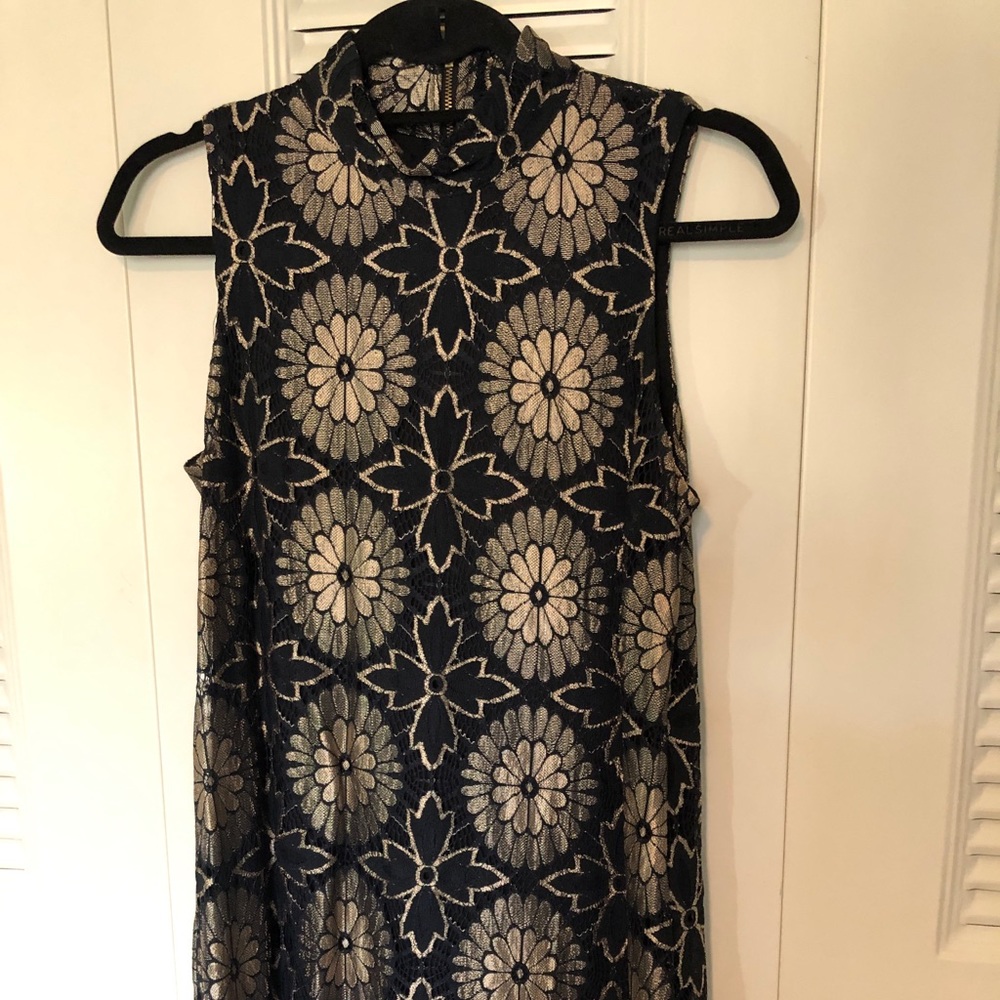 Mock neck black and gold sleeveless dress